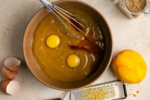 whisk and eggs in dough batter