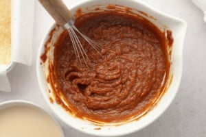 whisk in wet ingredients for pumpkin pie bars