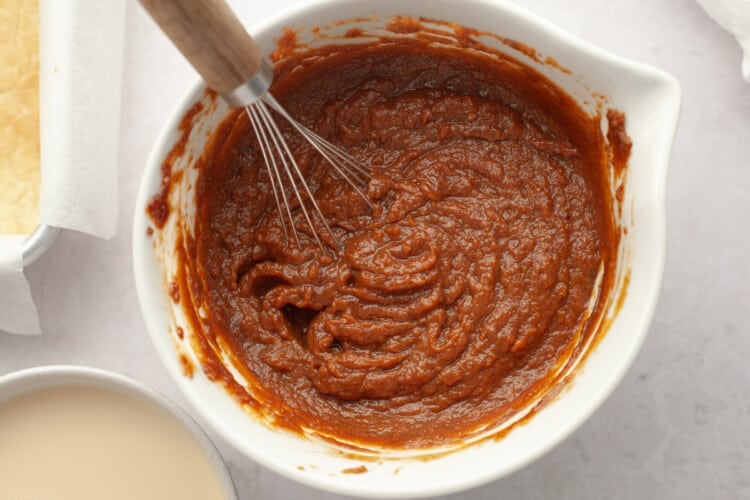 whisk in wet ingredients for pumpkin pie bars