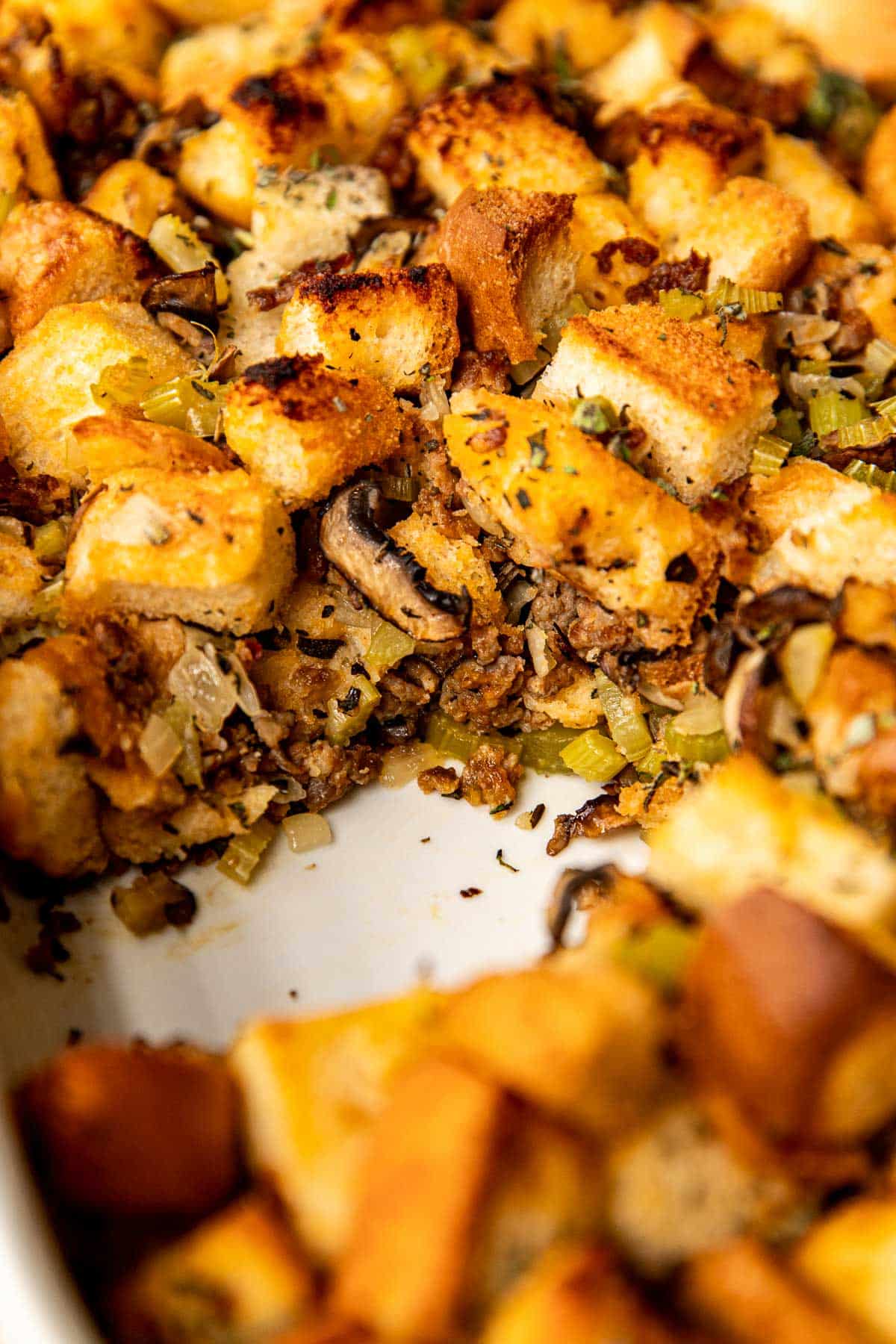 a close up image of sausage mushroom stuffing. 