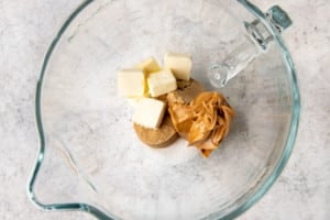 sugar and cubes of butter in a clear bowl