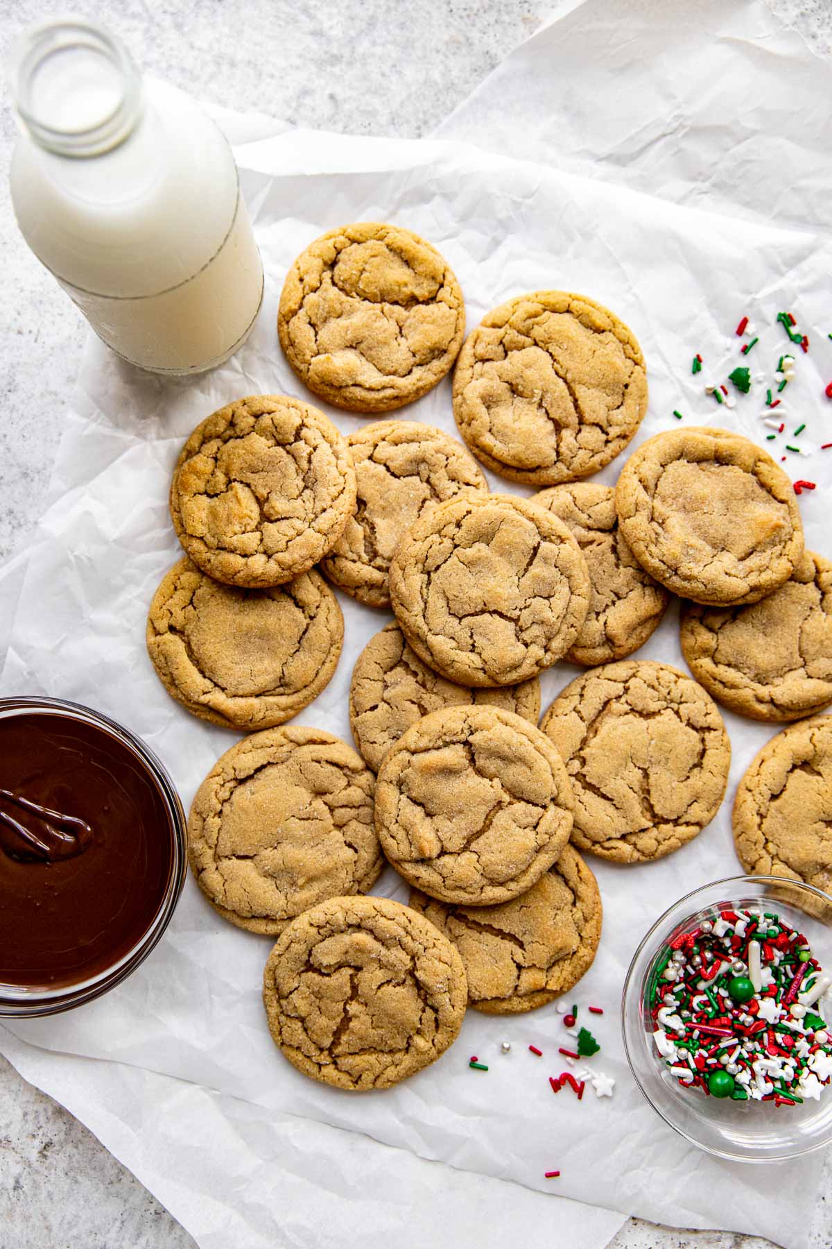 peanut butter cookies on white parchment paper. 
