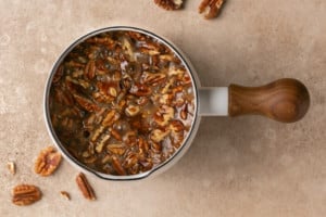 sauce pan melting pecan pie cookie ingredients