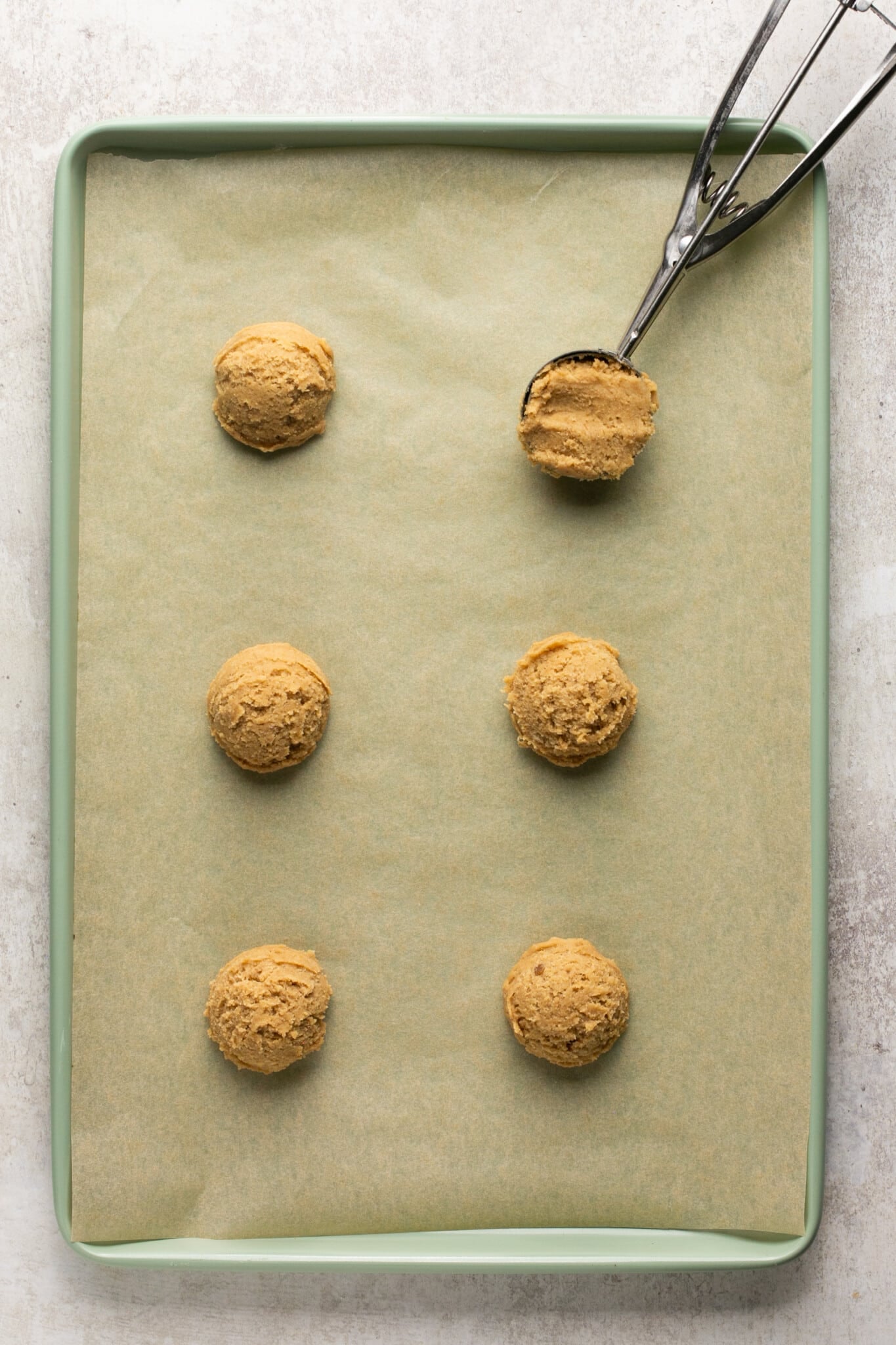 cookies on a baking sheet lined with parchment paper. 