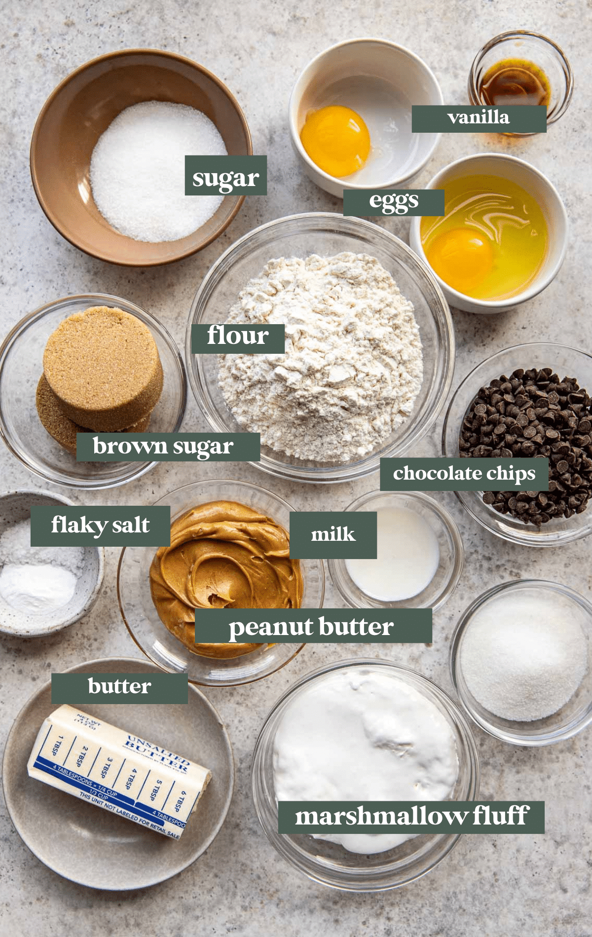 ingredients to make cookies in small glass bowls. 