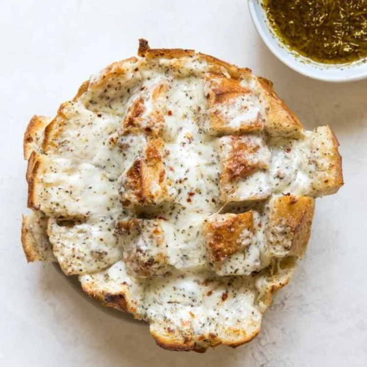 sourdough bread cut into pieces with spices sprinkled on top