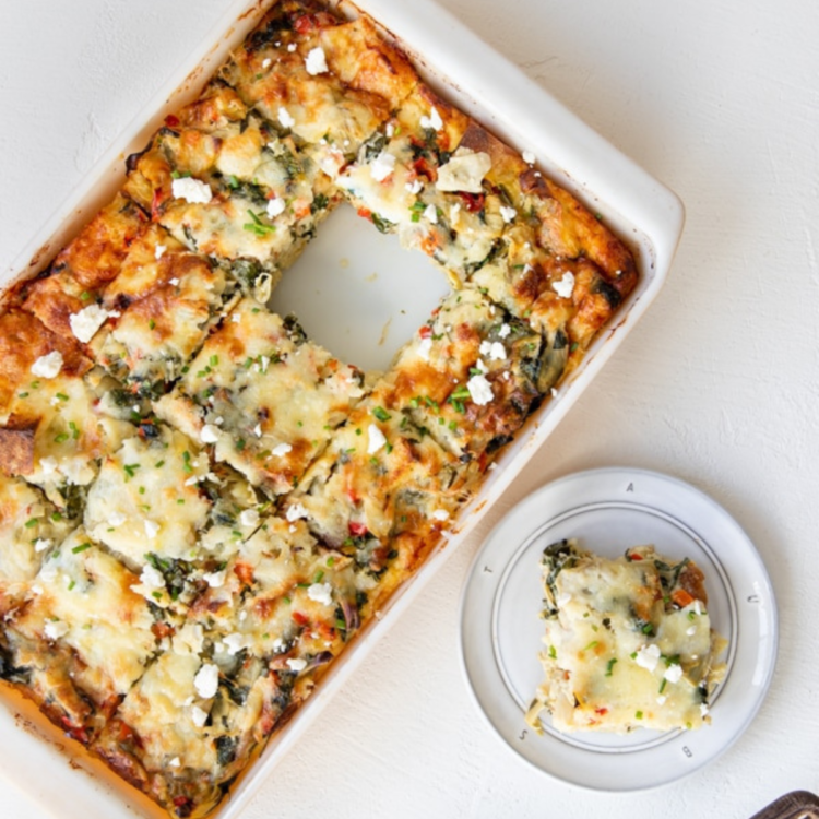 casserole dish with baked eggs & vegetables with one slice missing and on a plate