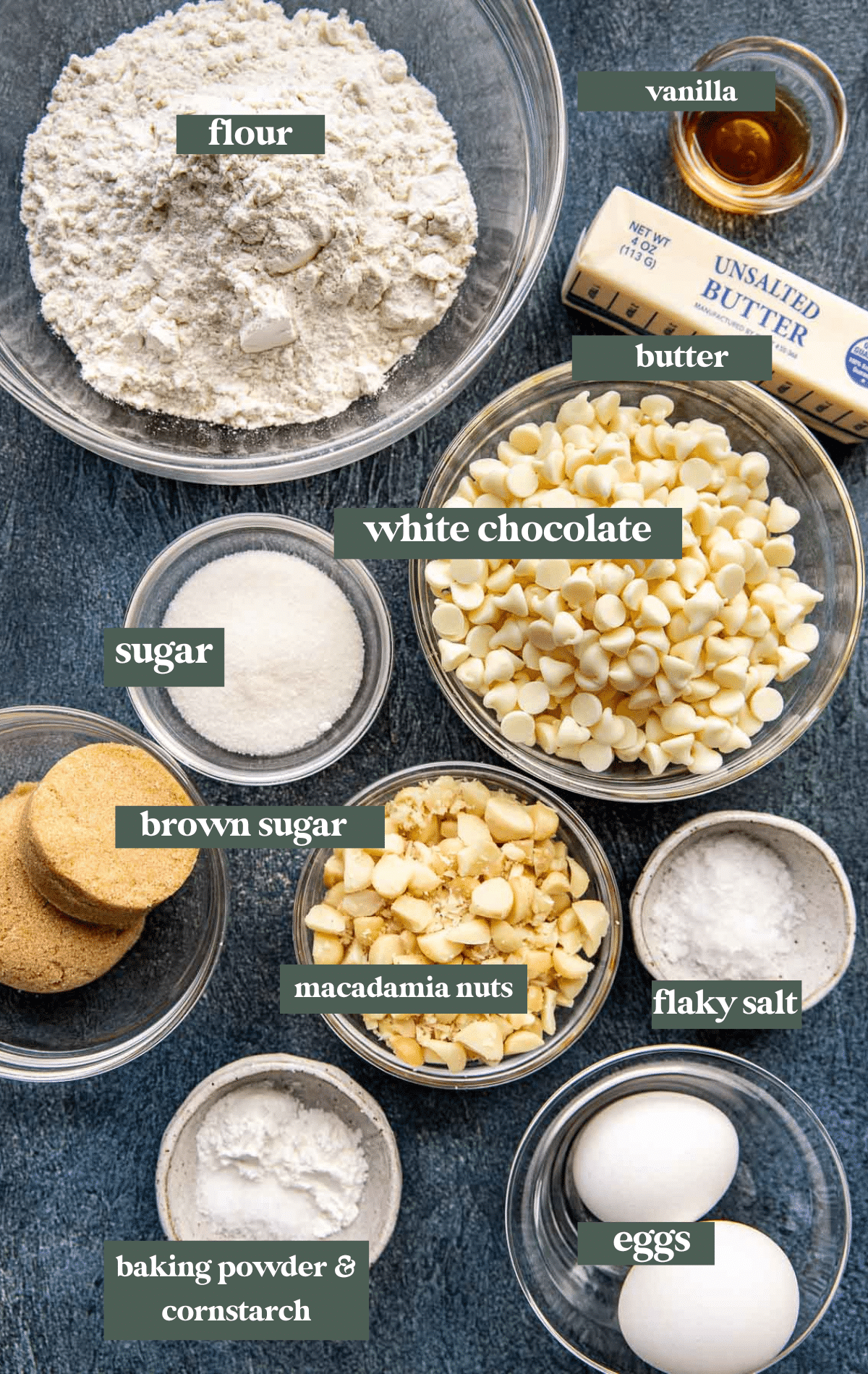 ingredients to make cookies in glass bowls. 