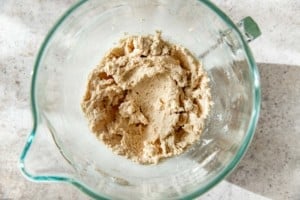 snickerdoodle cookie dough mix in a clear bowl