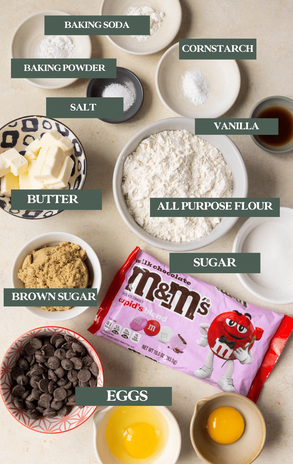 Ingredients needed to make cookies in small glass bowls. 
