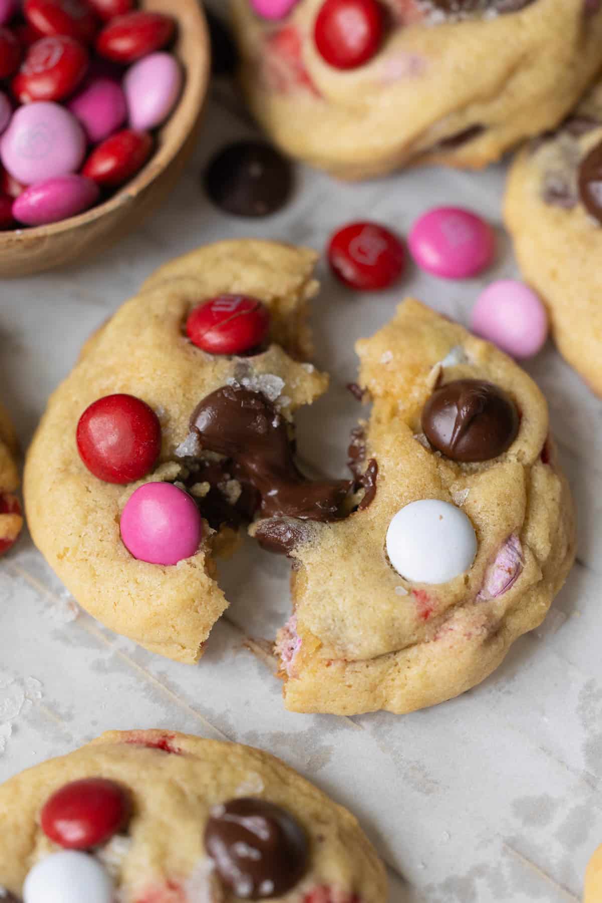 a cookie pulled a part with melty chocolate in the middle. 