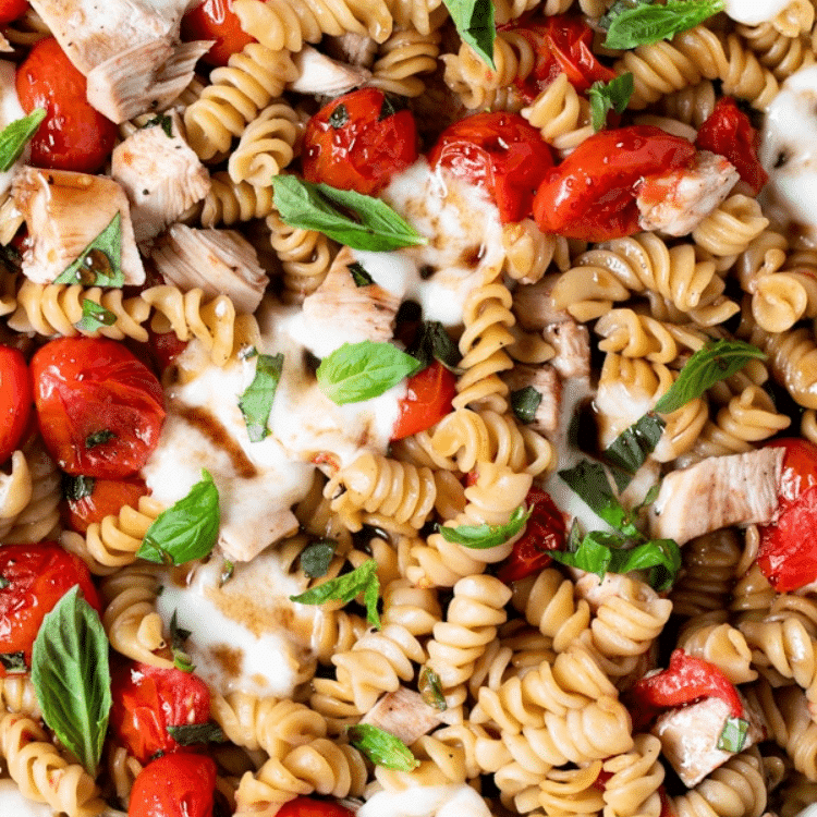 rotini pasta with mozzarella, basil, and cherry tomatoes