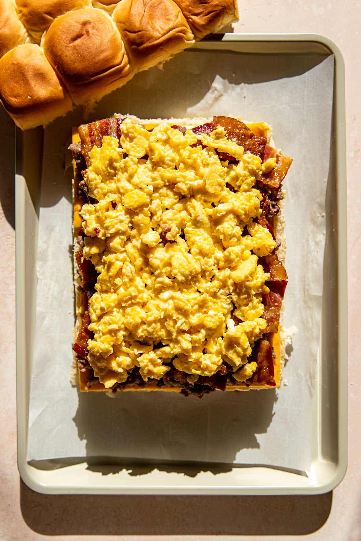 scrambled eggs and bacon on hawaiian rolls to make breakfast sliders. 