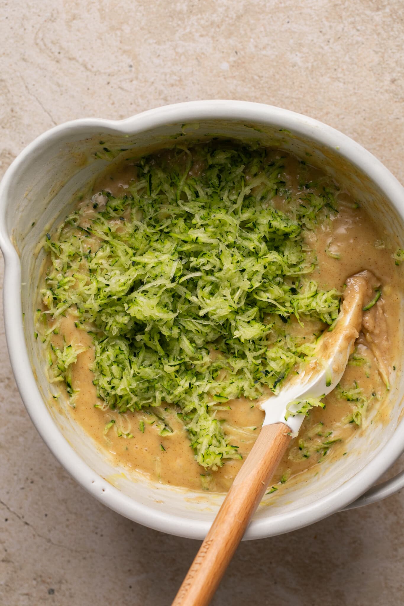 grated zucchini tossed into banana bread batter. 