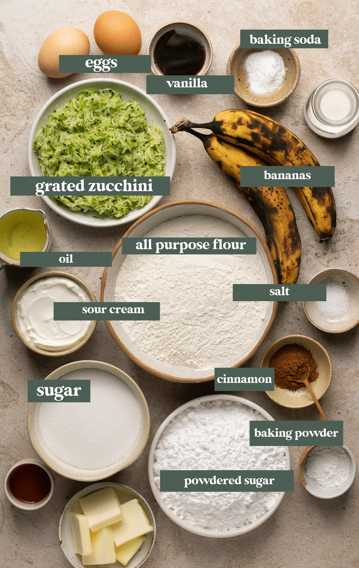 ingredients to make zucchini banana bread in small glass bowls. 