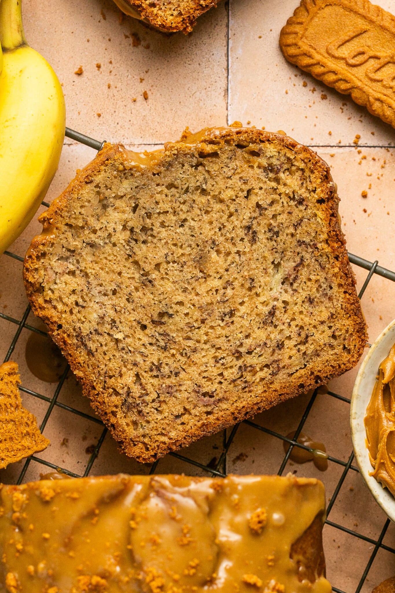 a slice on banana bread made with biscoff cookie butter.