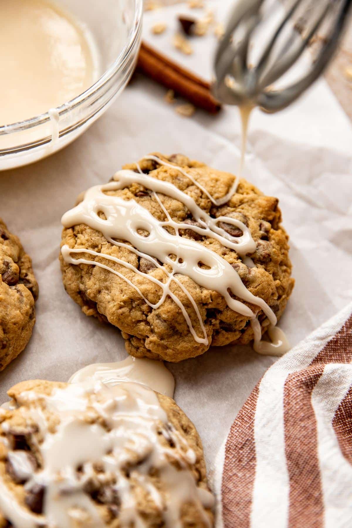 glaze being drizzled on a cookie. 