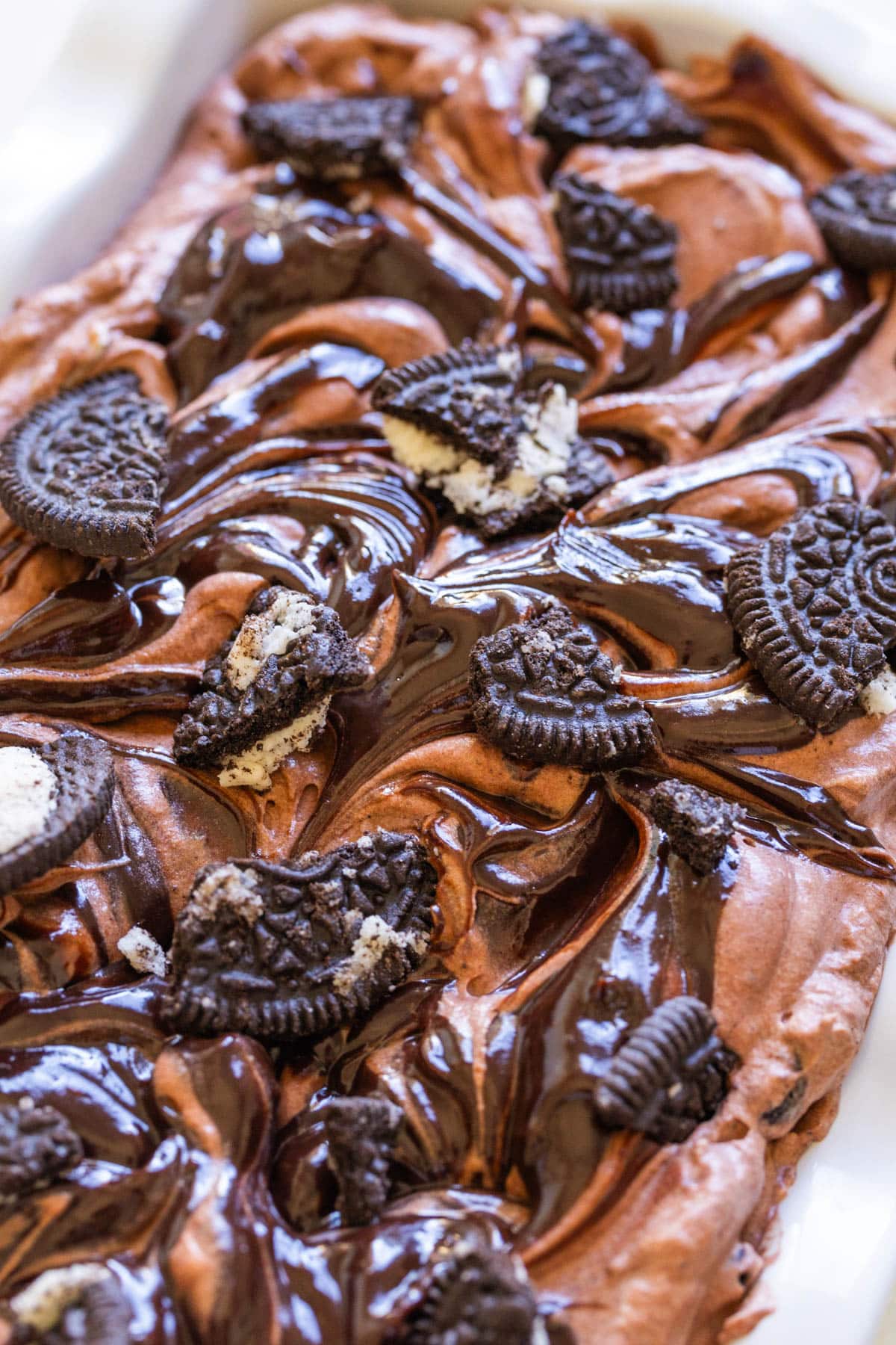 no churn ice cream with ganache and oreos on top. 
