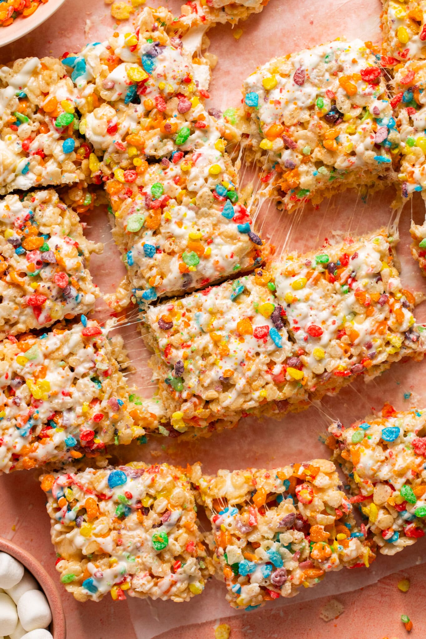 fruity pebble rice krispies cut into squares. 