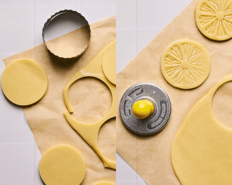 Cutting lemonade cookie dough out with circular cookie cutter then stamping with lemon cookie stamp.
