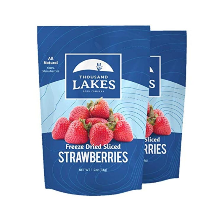 Two bags of freeze dried strawberries with blue logo.