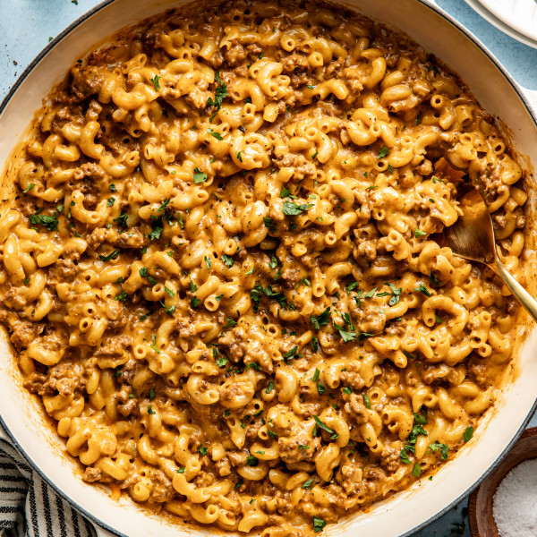 Hamburger macaroni in large pot with fork.