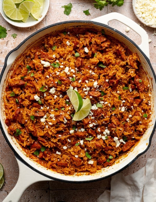 Spanish rice and chorizo recipe baked in skillet.