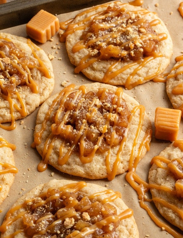 Apple pie cookies drizzled with caramel and coated with graham cracker crumbs.