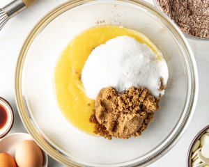 Melted butter and sugars in mixing bowl.