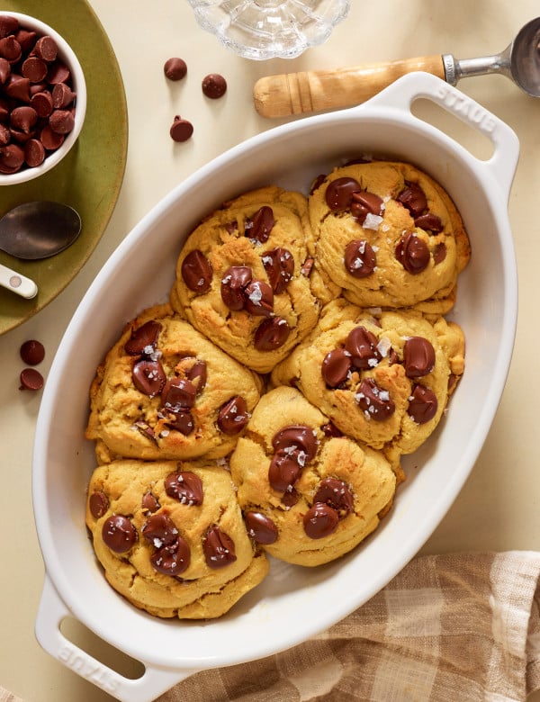 Six giant cookies baked together in a baking dish for viral "scoopable" cookie recipe.