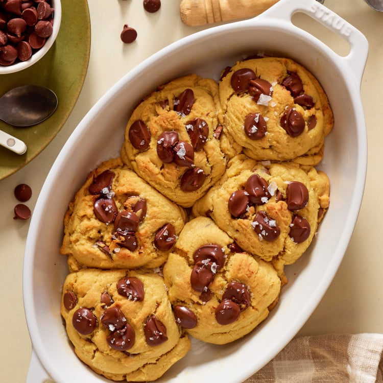 Six giant cookies baked together in a baking dish for viral "scoopable" cookie recipe.