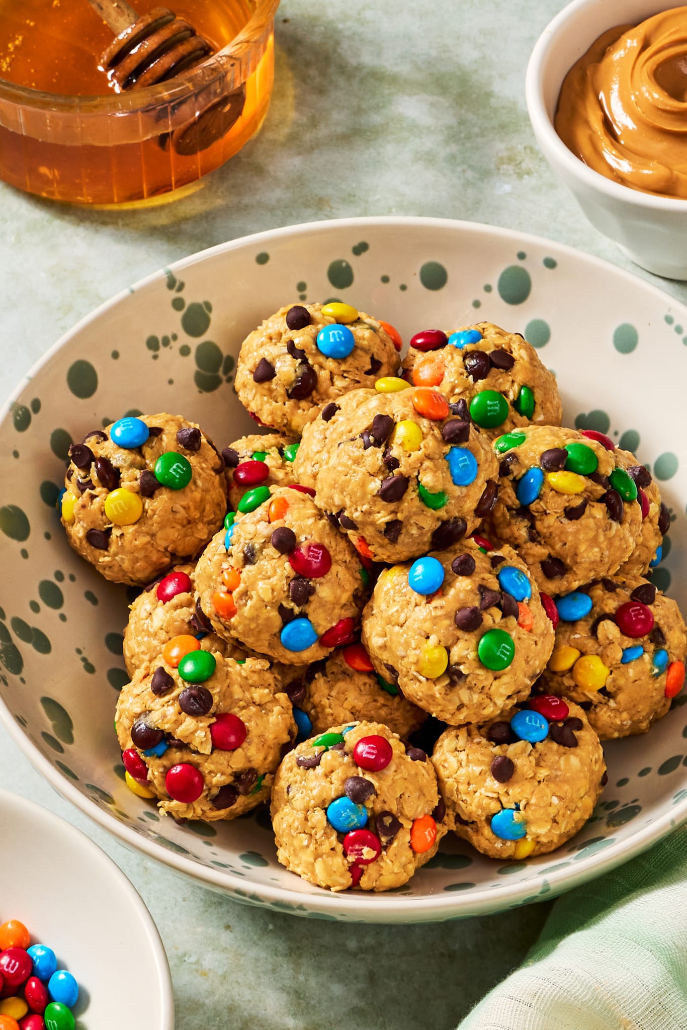Monster cookie energy bites in a large serving bowl.