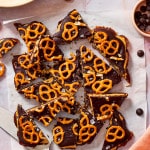 Pieces of date bark cut on a piece of parchment paper.