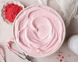 Raspberry whipped cream make in mixing bowl.