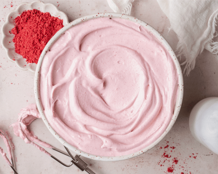 Raspberry whipped cream make in mixing bowl.